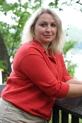 Obraz premium middle-aged blonde woman on nature background