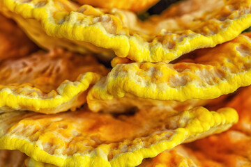 Yellow chicken of the woods mushroom grow close up, soft selective focus