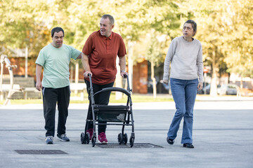 Group of People with Intellectual Disabilities Walking Outdoors
