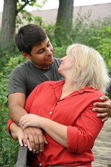 Obraz premium blonde woman with dark-skinned man,
