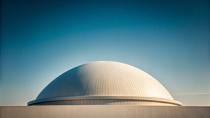 Obraz premium Minimalist Dome Architecture: Geometric Structure Against Clear Sky