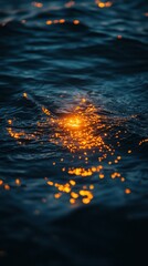 Sunset water reflection, ocean ripples, golden light