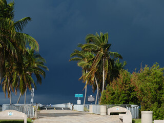 The entrance to the pedestrian walk on what used to be A1A's highway to Key West and now a fishing and excercise walking area under dark and menacing storm clouds due to Hurricane Milton
