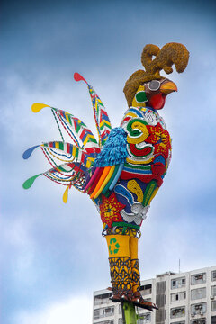 The iconic giant rooster sculpture decorates Recife's Carnival in Brazil with vibrant colors and intricate details.