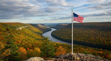 US flag on a pole with a natural landscape in the background