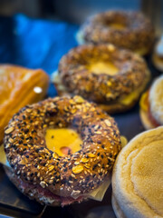 Donuts in the shelf for sale in the coffee shop