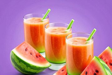 Three glasses of refreshing watermelon juice with watermelon slices.