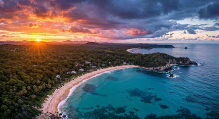 Fototapeta premium Tropical Paradise at Sunset – Aerial Coastal View