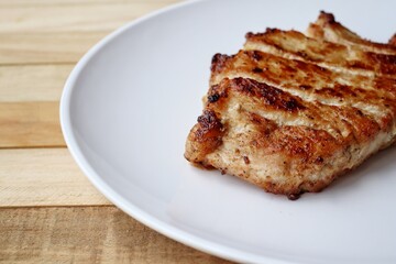 Pork steak grilled barbecue on the plate