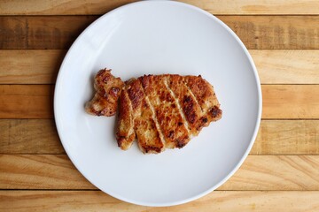 Pork steak grilled barbecue on the plate