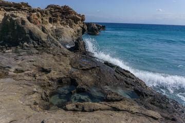 Beautiful landscape of Geopark of Agios Nikolaos a Petrified Forest at the mediterranean sea coast on a sunny spring day, Laconia, Peloponnese, Greece