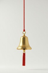 Obraz premium Simple white background with a single golden bell hanging from it, clean, golden bell