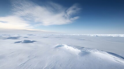 Snowy Mountain Landscape with Clear Sky and Clouds