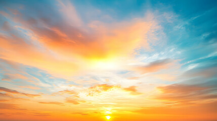 Fototapeta premium Vibrant Sunset Sky With Orange And Blue Hues Above Horizon With Golden Sunlight And Dramatic Clouds