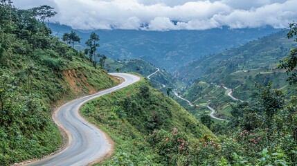 Fototapeta premium Winding Mountain Road Adventure Scenic Landscape Nature Photography Cloudy Atmosphere Aerial View