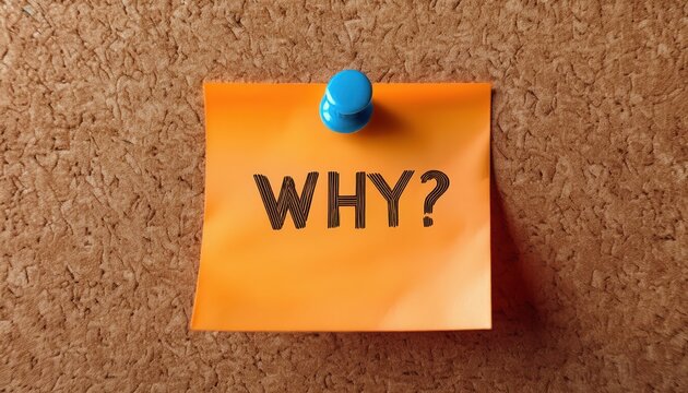 A thought-provoking orange sticky note asking 'WHY?' on a cork board.