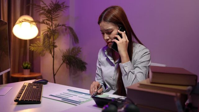 a businesswoman works late into the night because she has to deal with important contract documents that ned to be presented tomorrow, one of the employees worked overtime