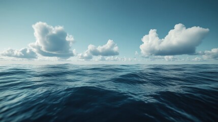 Fototapeta premium Calm Ocean Waves Under Soft Blue Clouds with Clear Sky