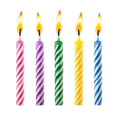 Festive burning birthday candles with vibrant multicolored stripes design