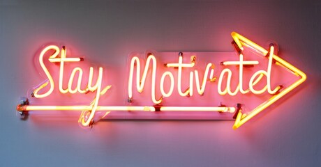 Obraz premium Neon sign stay motivated dynamic arrow flow glowing movement waves structured forward feel bright colorful realistic photo