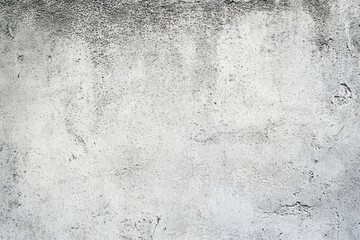 Fototapeta premium Grungy textured wall displays faded white and gray colors