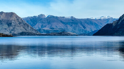 Aerial views of Glendhu Bay coastline at Lake Wanaka on a beautiful sunny day