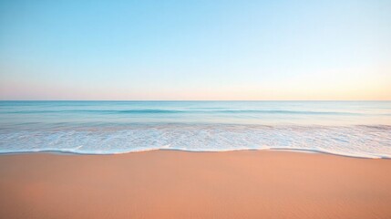 Obraz premium peaceful beach scene with pristine sand and gentle waves under clear skies
