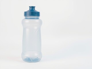 Naklejka premium Single plastic bottle discarded on the ground highlighting the issue of plastic pollution in nature
