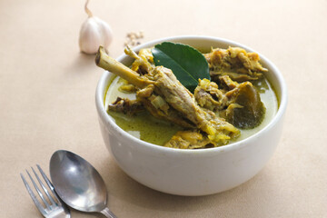 Opor Ayam, Indonesian traditional food, made from chicken cooked with coconut milk and spices. Popular during Eid al Fitr.