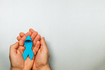 Blue ribbon symbolizing awareness for prostate cancer and male health issues