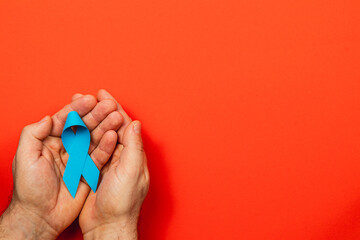 Blue ribbon symbolizes cancer awareness and support for patients