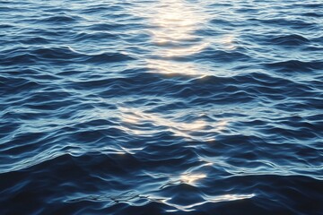Calm Blue Ocean Waves with Reflections of Sunlight at Dusk