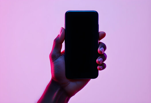 A hand holds a Phone against a purple background