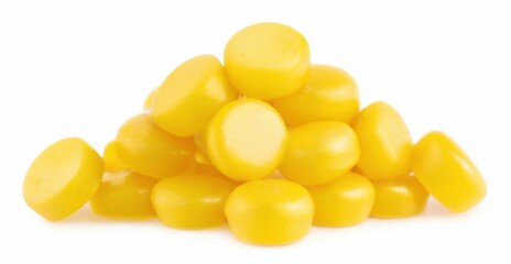 Fototapeta premium Vibrant Yellow Candies on White Background