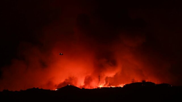 Palisades Fire Cresting the Santa Monica Mountains, Seen from San Fernando Valley, Los Angeles County, California
