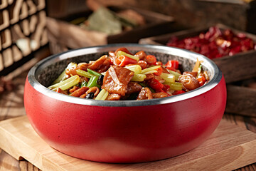 Braised pork intestines with black bean sauce, rice, pepper and celery