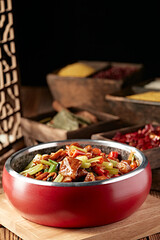Braised pork intestines with black bean sauce, rice, pepper and celery