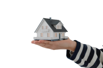 Hand holding miniature house model isolated on transparent background PNG 