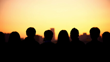 Fototapeta premium Silhouette of diverse people standing side by side, unity and inclusivity theme