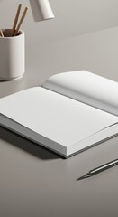 Blank Notebook and Pen Mockup on a Grey Desk
