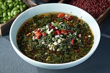 Oat noodles with wild chives, garlic and chili oil