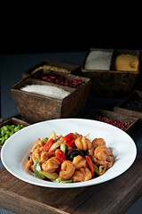 Fried pork rolls with pepper, black fungus and onion