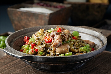 Double peppers, preserved vegetables and pork intestines in stone pot