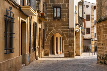 Medieval stone buildings and arches with stone columns in the Unesco city of Ubeda, Jaen.