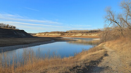 Fototapeta premium Serene River Trail at Golden Hour in Nature