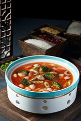 Russian-style tomato soup with broccoli, bamboo shoots and mushrooms