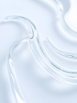 Close-up view of transparent gel with swirling waves on a matte surface for cosmetic product advertisements