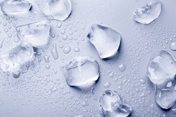 Pieces of crushed ice on light blue background, top view