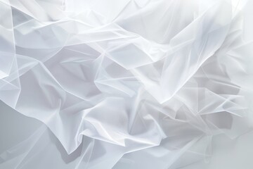 Obraz premium A close-up image of white, translucent fabric with layered drapes on a white background, A white background with layers of translucent shapes
