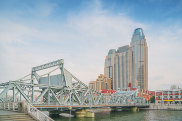 Fototapeta premium The urban architectural skyline, modern bridges, and Haihe River scenery of Tianjin, China on August 15, 2024 